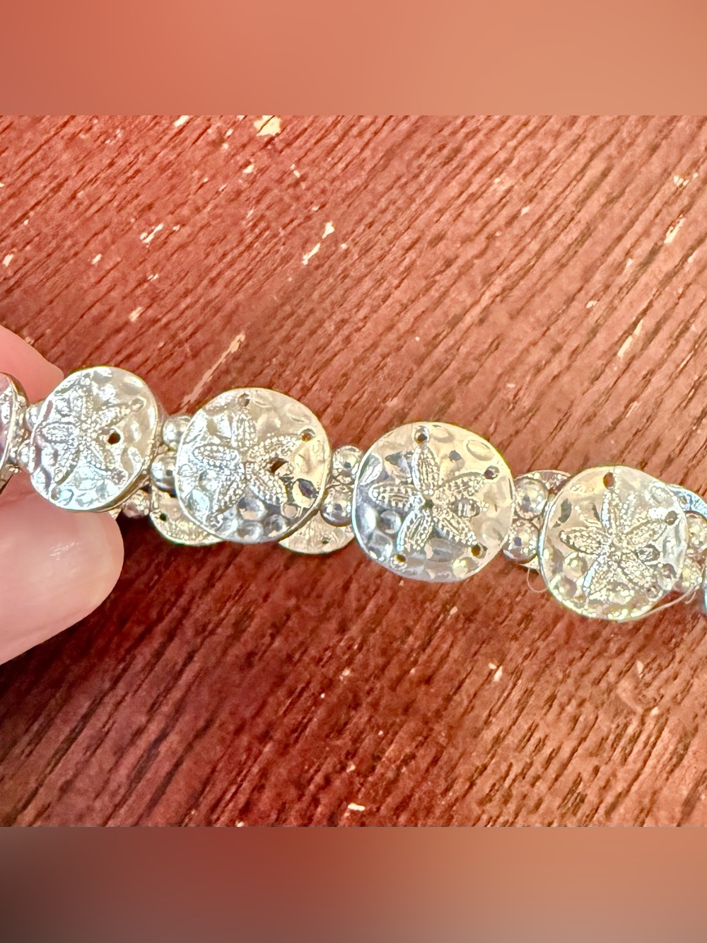 Silver Sand Dollar stretch Bracelet, new without tags.